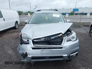 2018 Subaru Forester Touring with VIN JF2SJAWC6JH496875, listed as a IAAI auction lot 42347532 with 70,978 mi miles and . Bid and sale history available at DreamBid. Image 12.