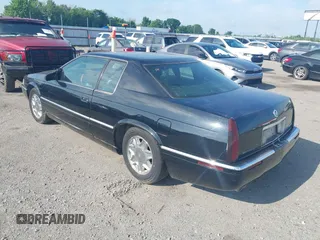2002 Cadillac Eldorado ESC with VIN 1G6EL12YX2B105502, listed as a IAAI auction lot 42121952 with 110,261 mi miles. Bid and sale history available at carsss.com. Image 3.
