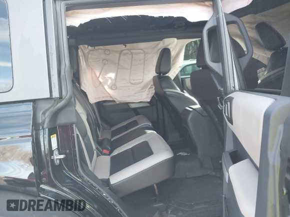 2023 Ford Bronco with VIN 1FMEE5DP9PLB82362, listed as a IAAI auction lot 41443809 with 13,567 mi miles and . Bid and sale history available at DreamBid. Image 8.
