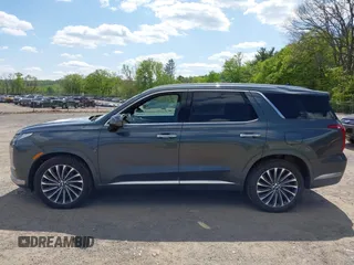 2023 Hyundai Palisade Calligraphy z VIN KM8R7DGE5PU499257, wystawiony jako IAAI lot #42231889 z przebiegiem 90 714 mil mil oraz . Historia ofert i sprzedaży dostępna na DreamBid. Obrazek 15.