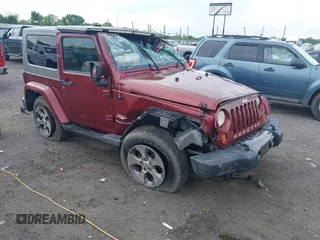 2008 Jeep Wrangler Sahara z VIN 1J4FA54168L512227, wystawiony jako IAAI lot #42106422 z przebiegiem 198 495 mil mil oraz . Historia ofert i sprzedaży dostępna na DreamBid. Obrazek 1.
