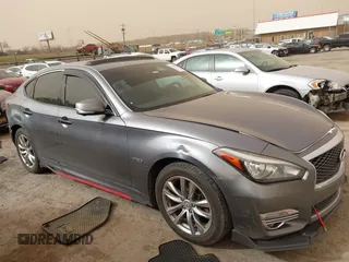 2015 Infiniti M35h Hybrid with VIN JN1EY1AP2FM510029, listed as a IAAI auction lot 41795913 with 152,475 mi miles. Bid and sale history available at carsss.com. Image 13.