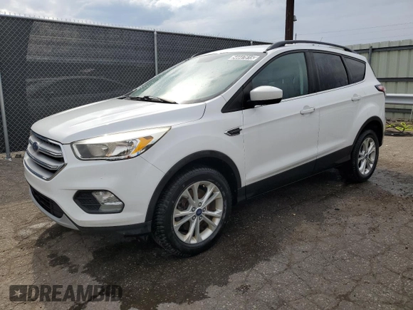 2018 Ford Escape SE with VIN 1FMCU9GD5JUA41244, listed as a Copart auction lot 54447615 with 128,542 mi miles and Clean Title. Bid and sale history available at carsss.com. Image 1.