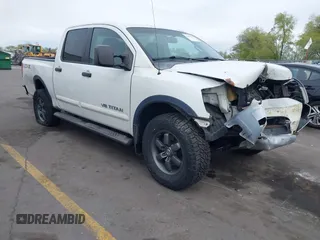 2014 Nissan Titan Pro-4X with VIN 1N6BA0ECXEN501915, listed as a IAAI auction lot 42097967 with 120,851 mi miles and . Bid and sale history available at DreamBid. Image 1.
