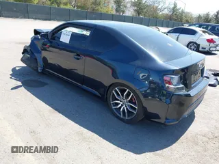 2015 Scion tC with VIN JTKJF5C77F3094936, listed as a IAAI auction lot 41830668 with 89,727 mi miles. Bid and sale history available at carsss.com. Image 3.