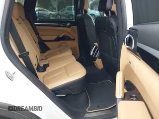 2014 Porsche Cayenne with VIN WP1AA2A27ELA09019, listed as a IAAI auction lot 42068012 with 77,997 mi miles and . Bid and sale history available at DreamBid. Image 8.