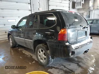 2007 GMC Envoy SLE with VIN 1GKDT13S472123167, listed as a IAAI auction lot 41385620 with 157,680 mi miles. Bid and sale history available at carsss.com. Image 3.
