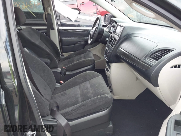 2017 Dodge Grand Caravan SE z VIN 2C4RDGBG0HR605507, wystawiony jako IAAI lot #42168499 z przebiegiem 169 422 mil mil oraz . Historia ofert i sprzedaży dostępna na DreamBid. Obrazek 5.