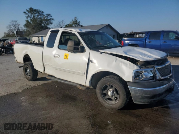 2000 Ford F-150 XL with VIN 1FTZX172XYNB23013, listed as a Copart auction lot 87393774 with 0 mi miles and Salvage Title. Bid and sale history available at carsss.com. Image 4.