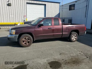 2005 Dodge Dakota SLT z VIN 1D7HE42KX5S149558, wystawiony jako Copart lot #56023315 z przebiegiem 273 289 mil mil oraz Szkoda całkowita • Salvage title. Historia ofert i sprzedaży dostępna na DreamBid. Obrazek 1.