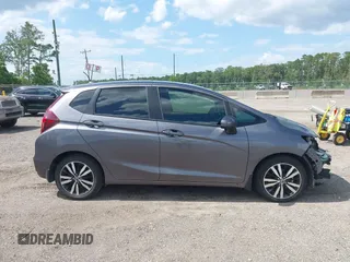 2019 Honda Fit EX z VIN 3HGGK5H89KM736677, wystawiony jako IAAI lot #42443401 z przebiegiem 58 559 mil mil oraz . Historia ofert i sprzedaży dostępna na DreamBid. Obrazek 14.