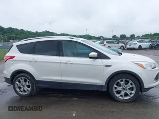 2016 Ford Escape Titanium with VIN 1FMCU9JX4GUB72080, listed as a IAAI auction lot 42519240 with 121,793 mi miles and . Bid and sale history available at DreamBid. Image 13.