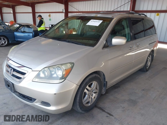 2005 Honda Odyssey EX-L with VIN 5FNRL38705B106488, listed as a IAAI auction lot 42545141 with 199,619 mi miles and . Bid and sale history available at DreamBid. Image 2.