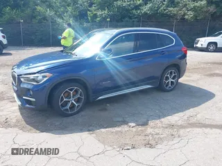 2017 BMW X1 xDrive28i with VIN WBXHT3C32H5F72371, listed as a IAAI auction lot 42763489 with 79,103 mi miles and . Bid and sale history available at DreamBid. Image 2.