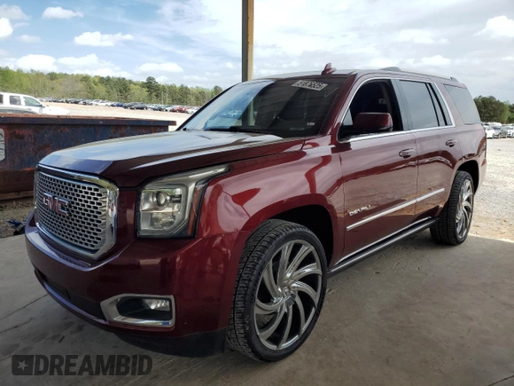 2016 GMC Yukon Denali with VIN 1GKS1CKJ9GR246441, listed as a Copart auction lot 51876925 with 158,323 mi miles and Salvage Title. Bid and sale history available at DreamBid. Image 1.