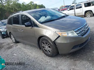 2013 Honda Odyssey EX z VIN 5FNRL5H40DB038886, wystawiony jako IAAI lot #41761738 z przebiegiem 244 107 mil mil oraz . Historia ofert i sprzedaży dostępna na DreamBid. Obrazek 1.