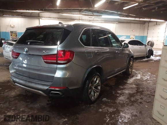 2018 BMW X5 xDrive35i with VIN 5UXKR0C53J0Y03214, listed as a IAAI auction lot 41509082 with 92,552 mi miles. Bid and sale history available at carsss.com. Image 4.