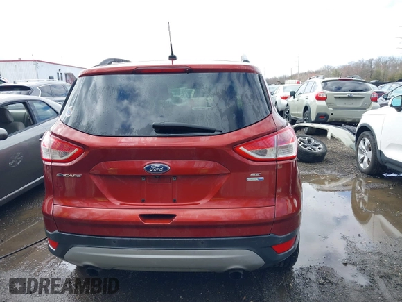 2016 Ford Escape SE with VIN 1FMCU9GXXGUB02932, listed as a IAAI auction lot 41797351 with 74,284 mi miles. Bid and sale history available at carsss.com. Image 16.