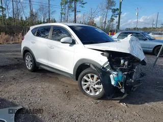 2019 Hyundai Tucson SE with VIN KM8J2CA48KU951829, listed as a IAAI auction lot 41261166 with 100,533 mi miles. Bid and sale history available at carsss.com. Image 1.