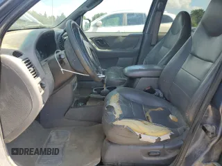 2001 Ford Escape XLT z VIN 1FMYU04111KB13287, wystawiony jako Copart lot #62183415 z przebiegiem 237 142 mil mil oraz Szkoda całkowita • Salvage title. Historia ofert i sprzedaży dostępna na DreamBid. Obrazek 7.