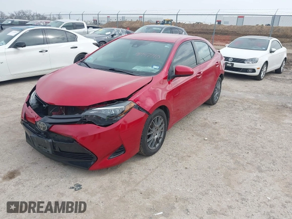 2019 Toyota Corolla L with VIN 5YFBURHEXKP882871, listed as a IAAI auction lot 41747710 with 104,117 mi miles. Bid and sale history available at carsss.com. Image 18.