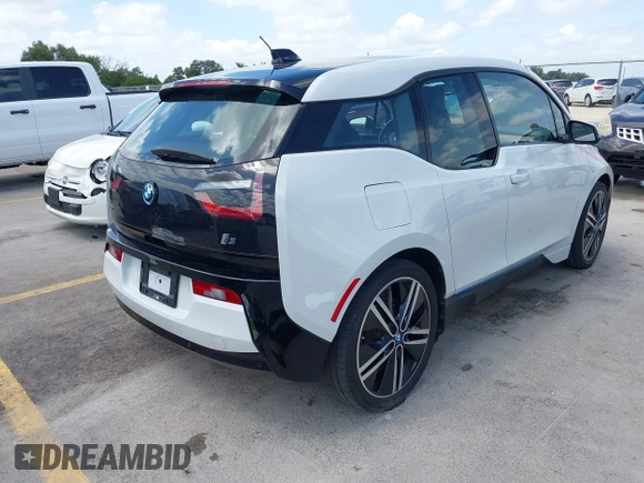 2014 BMW i3 with VIN WBY1Z4C50EV276518, listed as a IAAI auction lot 42631879 with 80,871 mi miles and . Bid and sale history available at DreamBid. Image 4.