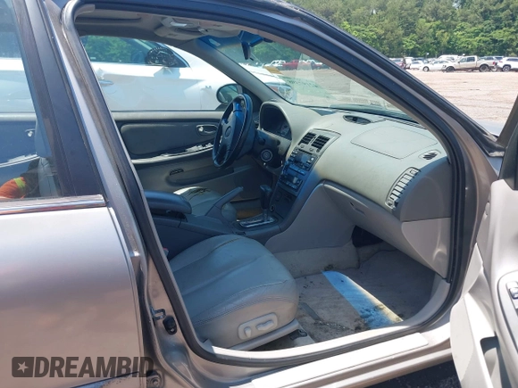 2000 Nissan Maxima GXE z VIN JN1CA31D0YT531421, wystawiony jako IAAI lot #42197398 z przebiegiem Nie podano mil oraz . Historia ofert i sprzedaży dostępna na DreamBid. Obrazek 5.