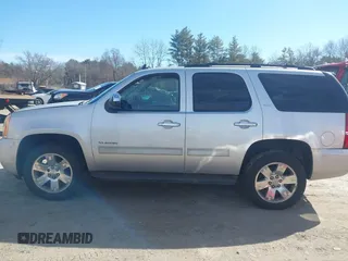 2011 GMC Yukon SLT with VIN 1GKS2CE01BR186874, listed as a IAAI auction lot 41762705 with 249,283 mi miles. Bid and sale history available at carsss.com. Image 14.