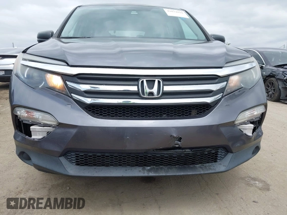 2016 Honda Pilot LX with VIN 5FNYF5H14GB037205, listed as a IAAI auction lot 42034018 with 101,943 mi miles and . Bid and sale history available at DreamBid. Image 6.