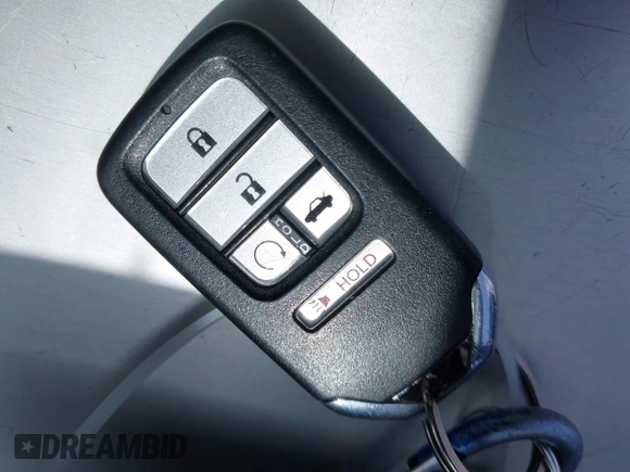 2020 Honda Accord with VIN 1HGCV3F11LA015901, listed as a IAAI auction lot 42022659 with 131,865 mi miles and . Bid and sale history available at DreamBid. Image 11.