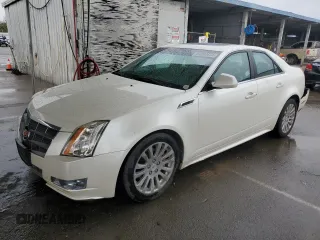 2011 Cadillac CTS Sedan Premium with VIN 1G6DP5ED3B0116188, listed as a Copart auction lot 84890634 with 59,528 mi miles and Salvage Title. Bid and sale history available at carsss.com. Image 1.
