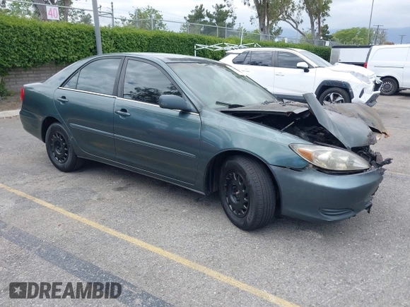 2002 Toyota Camry XLE z VIN 4T1BF32K82U530294, wystawiony jako IAAI lot #42251586 z przebiegiem Nie podano mil oraz . Historia ofert i sprzedaży dostępna na DreamBid. Obrazek 1.