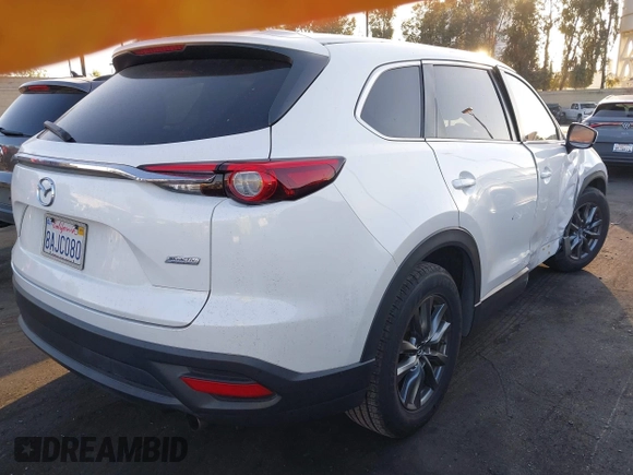 2018 Mazda CX-9 Sport with VIN JM3TCABY8J0204499, listed as a IAAI auction lot 42374933 with 114,408 mi miles and . Bid and sale history available at DreamBid. Image 4.