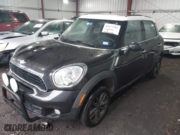 2014 MINI Countryman S with VIN WMWZC5C53EWP40677, listed as a IAAI auction lot 41473281 with 108,616 mi miles and . Bid and sale history available at DreamBid. Image 2.