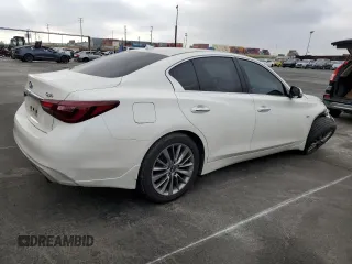 2019 Infiniti Q50 Luxe with VIN JN1EV7APXKM541762, listed as a Copart auction lot 59035515 with 59,295 mi miles and Salvage title. Bid and sale history available at DreamBid. Image 3.
