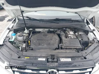 2018 Volkswagen Tiguan S with VIN 3VV1B7AX1JM032250, listed as a IAAI auction lot 42366790 with 65,406 mi miles and . Bid and sale history available at DreamBid. Image 10.