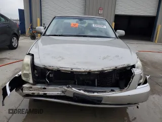 2006 Cadillac DTS 1SD z VIN 1G6KD57Y26U115094, wystawiony jako Copart lot #53534355 z przebiegiem 126 631 mil mil oraz Szkoda całkowita • Salvage title. Historia ofert i sprzedaży dostępna na DreamBid. Obrazek 5.