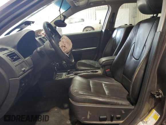 2012 Ford Fusion SEL with VIN 3FAHP0JG2CR189853, listed as a Copart auction lot 51018065 with 234,744 mi miles and Salvage Title. Bid and sale history available at DreamBid. Image 7.