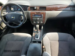 2012 Chevrolet Impala LS Fleet with VIN 2G1WF5E34C1126565, listed as a Copart auction lot 60233495 with 154,528 mi miles and Salvage title. Bid and sale history available at DreamBid. Image 8.
