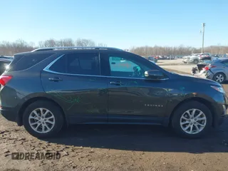 2018 Chevrolet Equinox LT z VIN 2GNAXSEV2J6122861, wystawiony jako IAAI lot #41741471 z przebiegiem 121 123 mil mil oraz . Historia ofert i sprzedaży dostępna na DreamBid. Obrazek 13.