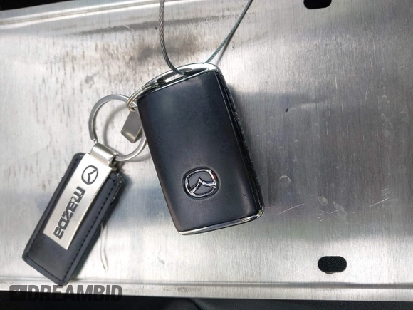 2022 Mazda 3 Select z VIN 3MZBPABL9NM316998, wystawiony jako IAAI lot #42117951 z przebiegiem 44 594 mil mil oraz . Historia ofert i sprzedaży dostępna na DreamBid. Obrazek 11.
