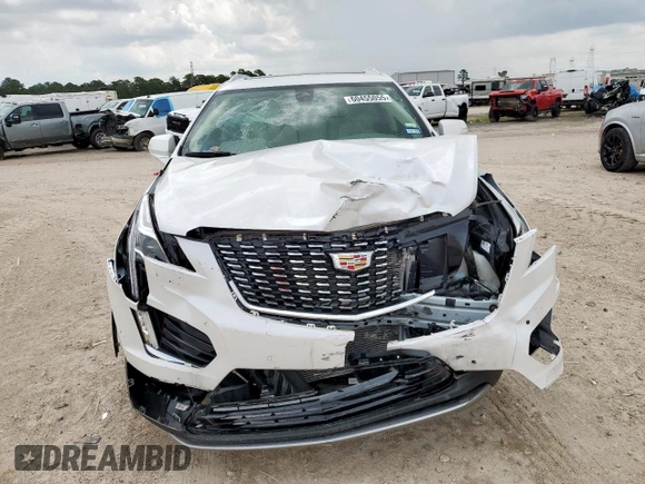2024 Cadillac XT5 FWD Premium Luxury with VIN 1GYKNCRS9RZ706158, listed as a Copart auction lot 60455055 with 7,999 mi miles and Salvage title. Bid and sale history available at DreamBid. Image 5.