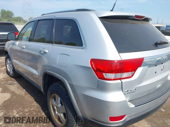2011 Jeep Grand Cherokee Laredo with VIN 1J4RR4GG0BC515356, listed as a IAAI auction lot 42581314 with 193,226 mi miles and . Bid and sale history available at DreamBid. Image 3.
