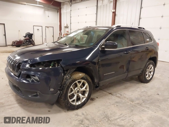 2014 Jeep Cherokee Latitude with VIN 1C4PJMCS9EW239549, listed as a IAAI auction lot 41156954 with 167,331 mi miles and . Bid and sale history available at DreamBid. Image 17.