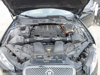2013 Jaguar XF V6 SC with VIN SAJWJ0EF1D8S81898, listed as a IAAI auction lot 41951634 with 113,697 mi miles. Bid and sale history available at carsss.com. Image 10.