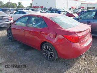2017 Toyota Corolla L with VIN 2T1BURHE6HC831795, listed as a IAAI auction lot 42561179 with 94,236 mi miles and . Bid and sale history available at DreamBid. Image 3.