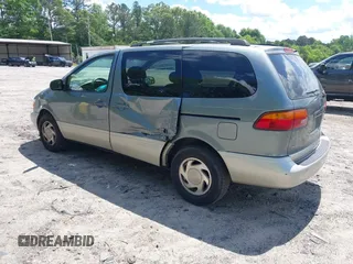 1998 Toyota Sienna LE with VIN 4T3ZF13C9WU029468, listed as a IAAI auction lot 42199057 with Not provided miles and . Bid and sale history available at DreamBid. Image 3.
