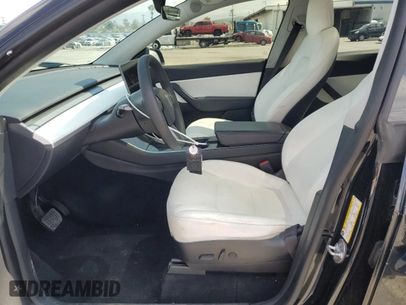 2020 Tesla Model Y Long Range with VIN 5YJYGDEE6LF051549, listed as a Copart auction lot 55063805 with 77,861 mi miles and Salvage Title. Bid and sale history available at DreamBid. Image 7.