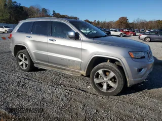 2014 Jeep Grand Cherokee Overland with VIN 1C4RJFCG0EC226397, listed as a Copart auction lot 80295784 with 131,921 mi miles and Salvage Title. Bid and sale history available at DreamBid. Image 4.