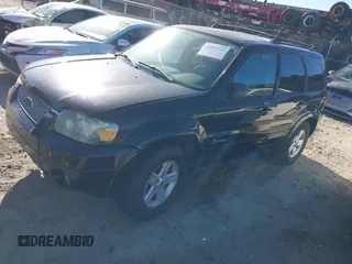 2006 Ford Escape Hybrid with VIN 1FMCU96H26KA26076, listed as a IAAI auction lot 41833227 with 236,280 mi miles and . Bid and sale history available at DreamBid. Image 2.